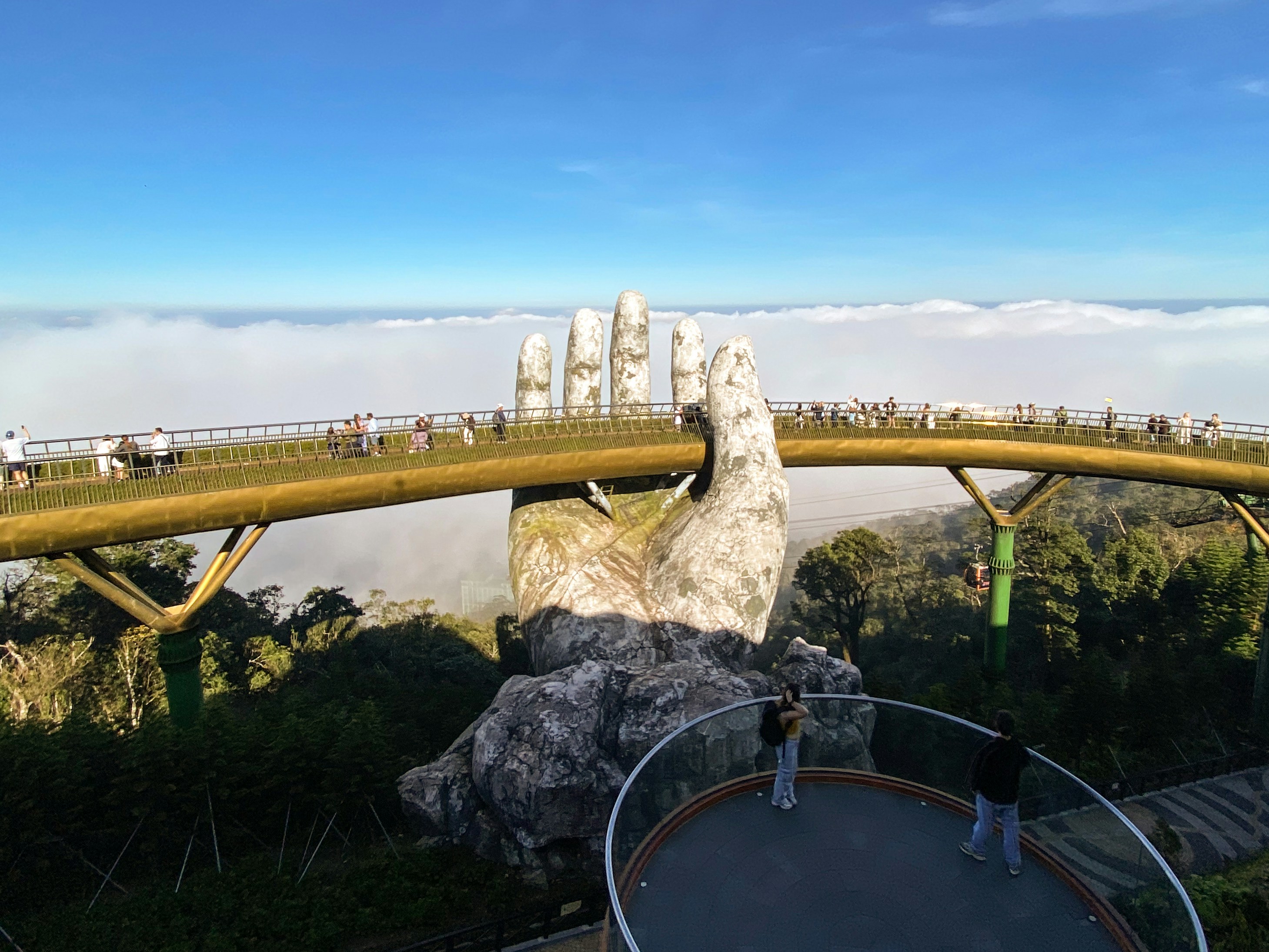 Experience the surreal beauty of the Golden Bridge - suspended between heaven and earth