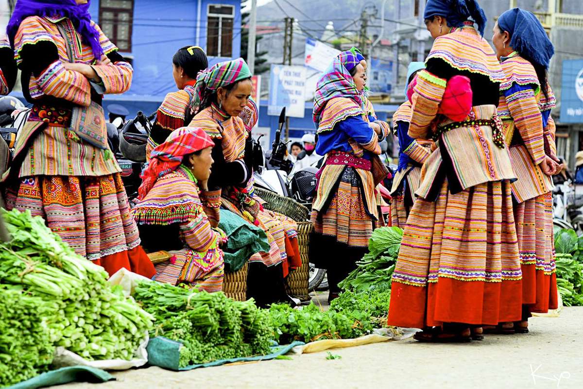 Traditional costumes, local produce, and vibrant culture at a weekly market in Ha Giang