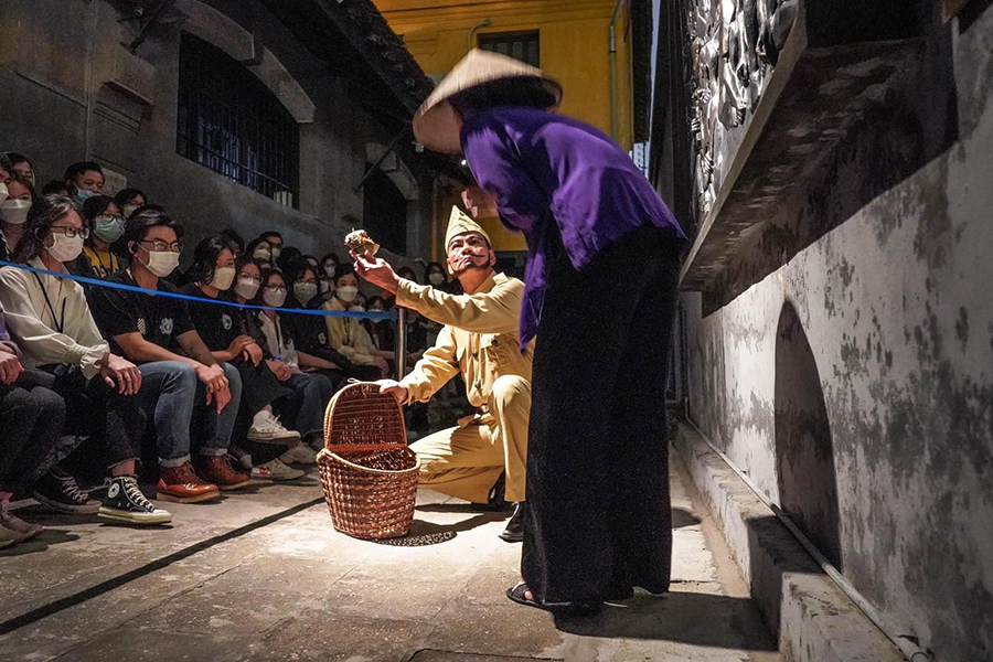Step into history after dark with the Hoa Lo Prison night tour