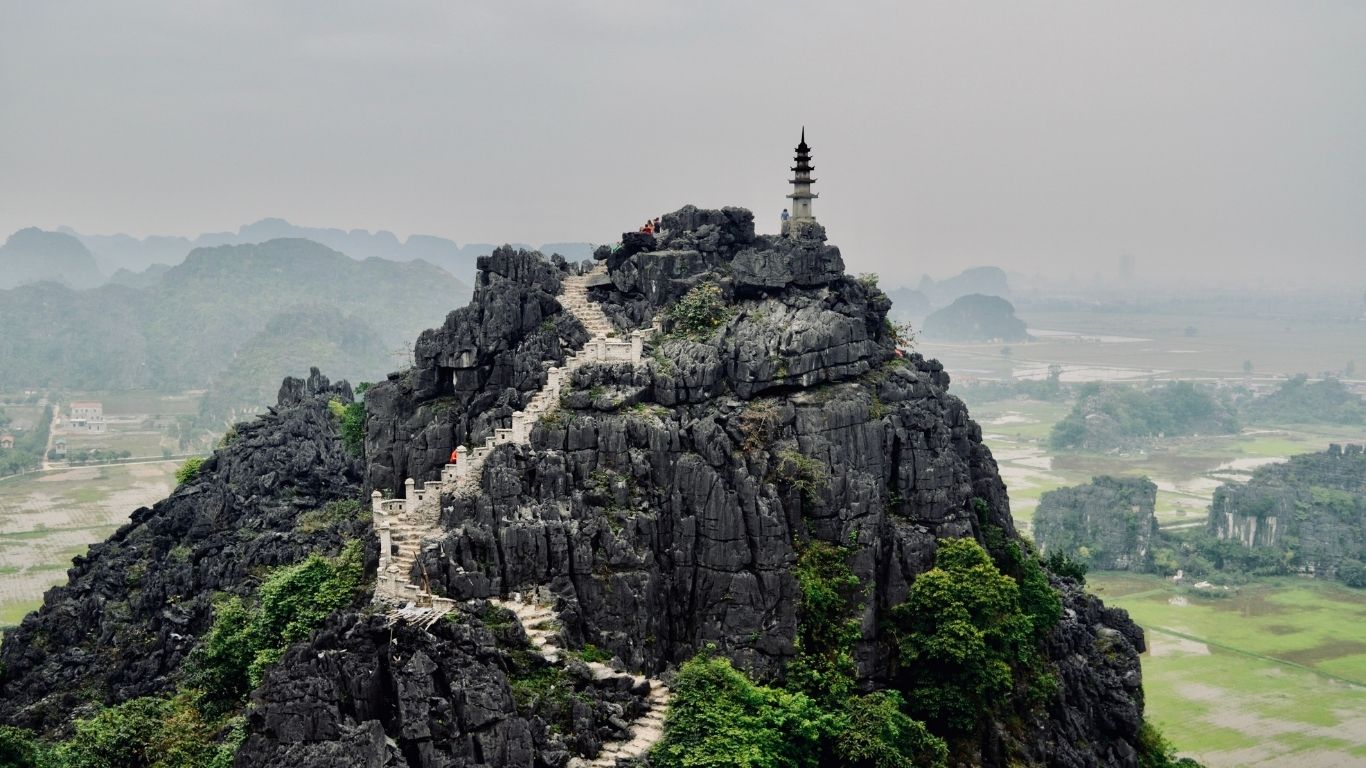 Climb to the top of Mua Cave for breathtaking panoramic views of Ninh Binh’s limestone peaks and winding rivers