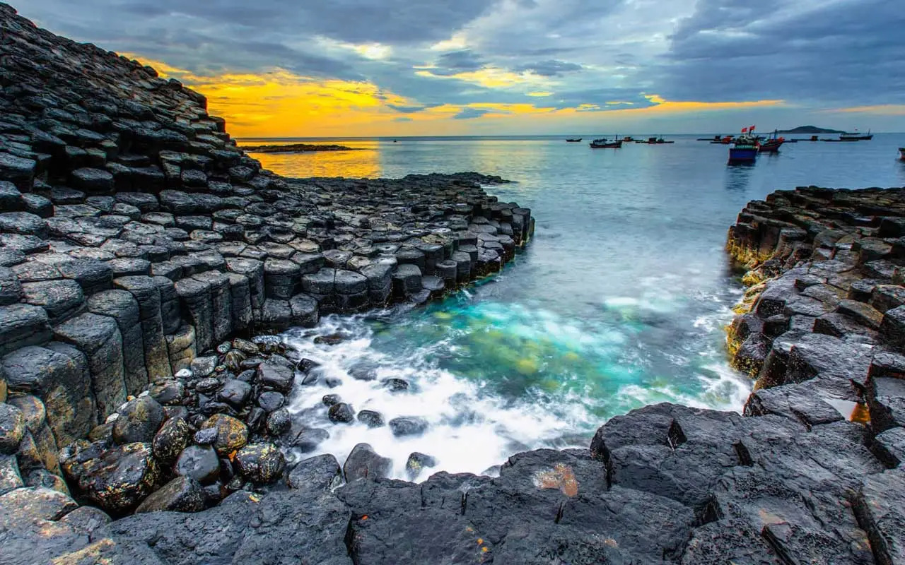 Waves crash against Ganh Da Dia’s ancient basalt columns on Vietnam’s central coast