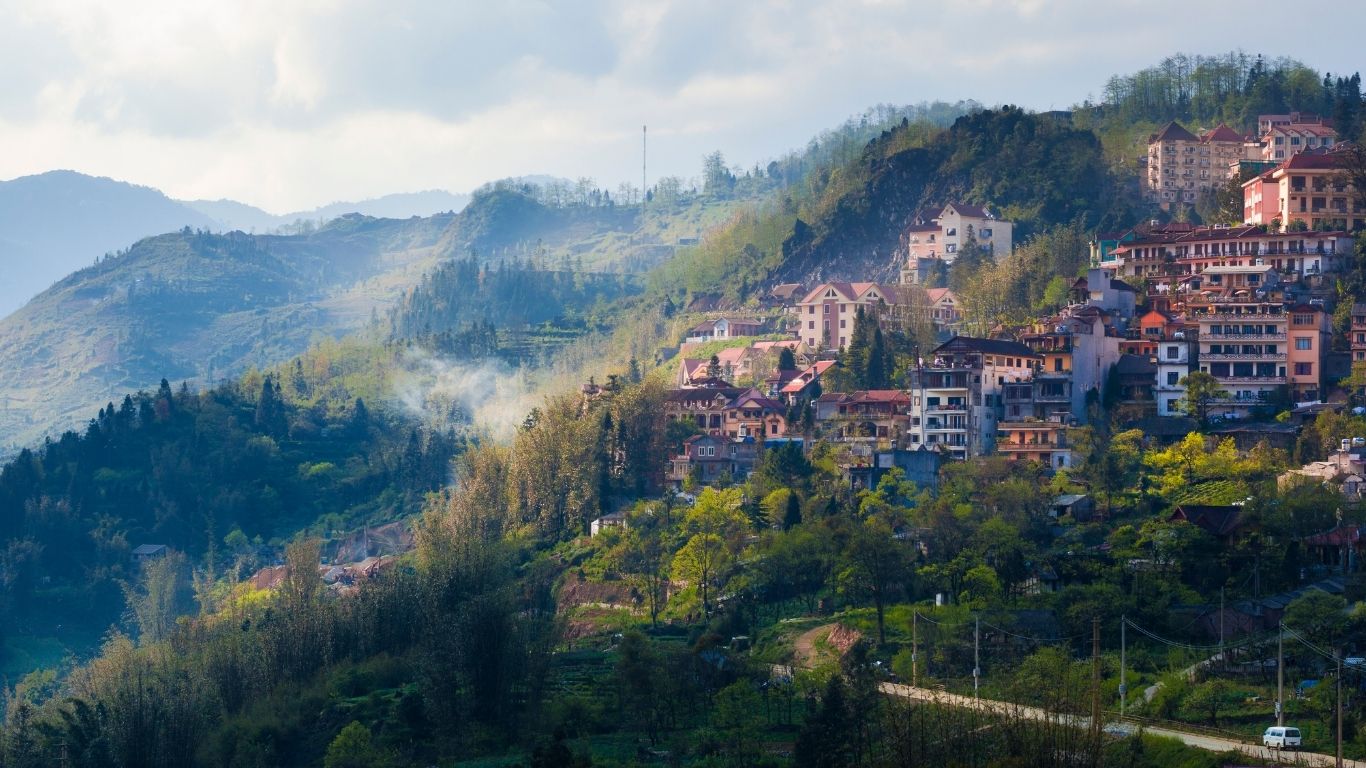 Lose yourself in the majestic beauty of Sapa’s terraced mountains and rolling clouds