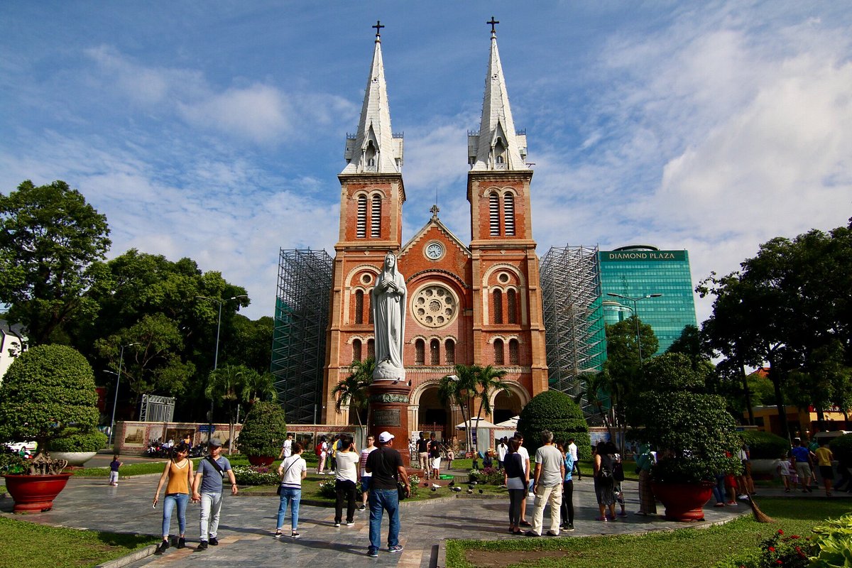 Red-brick façade of Notre-Dame Cathedral, a must-see landmark in Ho Chi Minh City